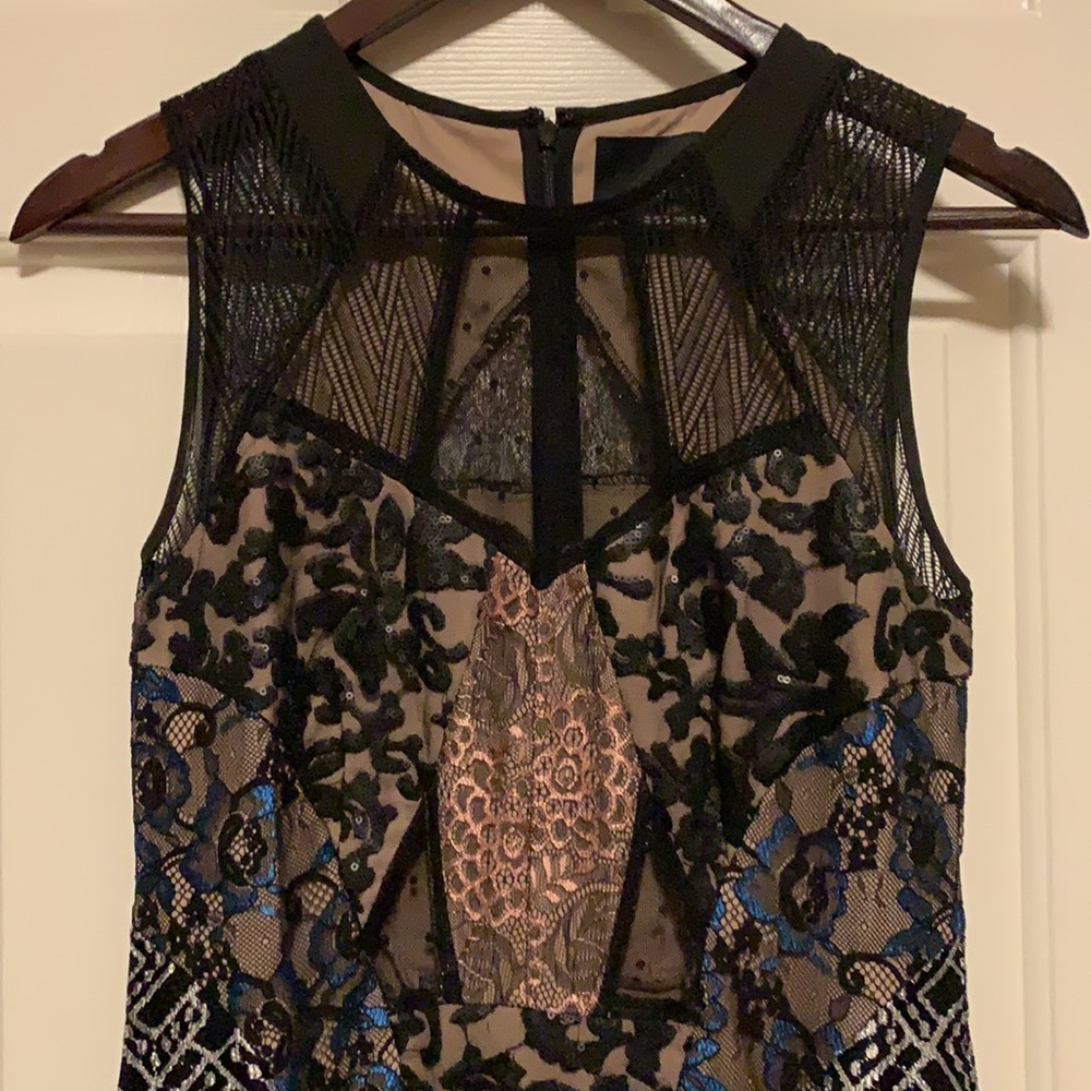 Mixed lace patterned dress with sheer cutouts